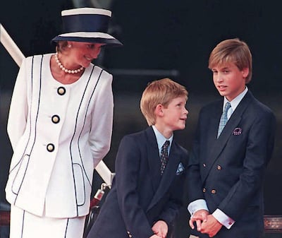 Diana with her sons Prince Harry, centre, and Prince William in London, in 1995. Johnny Eggitt / AFP