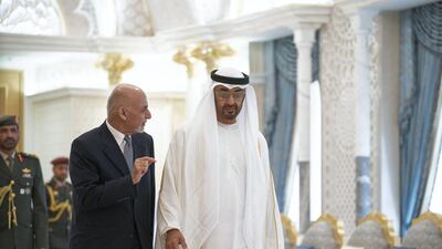 Sheikh Mohamed bin Zayed receives Mr Ghani during a reception at the Presidential Palace.