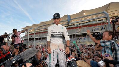Mercedes driver Lewis Hamilton celebrates winning the US Grand Prix on Sunday in Austin, Texas. Mark Ralston / AFP / November 2, 2014