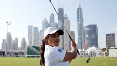 The Dubai-based amateur Kavita Sehmi, 17, practices at the driving range yesterday before she tees off in the Dubai Ladies Masters today at Emirates Golf Club. Sarah Dea / The National