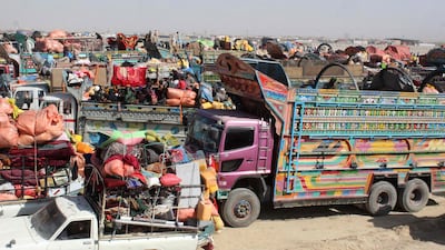 Afghan refugees arrive in trucks and cars to cross the Pakistan-Afghanistan border in Chaman. AFP