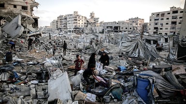 The Palestinian woman lives in a bomb-damaged building in Gaza city. Bloomberg