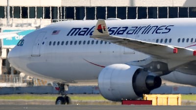 A Malaysia Airlines plane at Sydney Airport. Muhammad Arif was arrested after his flight returned to the airport. AP