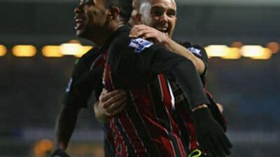 Joey Ireland, right, congratulates the Brazil striker Robinho after his late equalliser ensured Manchester City left Ewood Park with a point against Blackburn.
