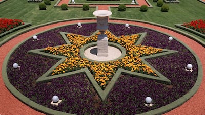 A star-shaped flower-bed honours one of the symbols of Bahaism outside the Shrine of the Bab of the Bahai faith July 14, 2008 in the northern Israeli city of Haifa. Getty Images