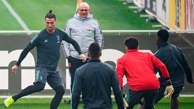 Juventus forward Cristiano Ronaldo, left, training with Juventus in Turin ahead of their Champions League match against Lyon. AFP