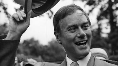 US actor Larry Hagman raising his hat at the Royal Ascot races June 10, 1980. Getty Images