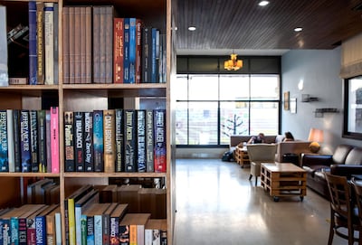 In addition to food, Third Place Cafe also has second-hand books lining the walls, and a quiet room upstairs. Victor Besa / The National