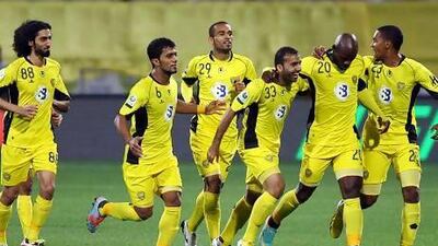 Al Wasl players celebrate after scoring the first goal against Al Ain during their match this week in Dubai. Satish Kumar / The National