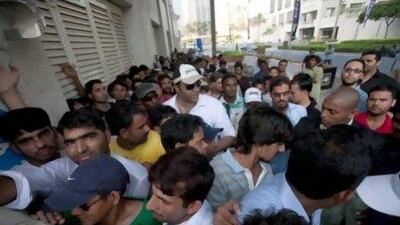 People paid to stand in lines waited for two days to collect a token for an opportunity to purchase property from Emaar. Mike Young / The National