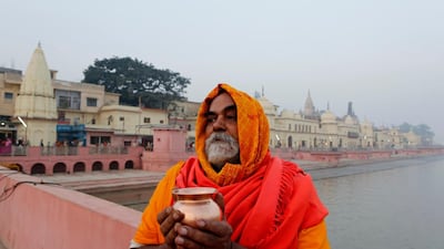 A Hindu holy man offers prayers in Ayodhya ahead of the Supreme Court's decision. AP Photo