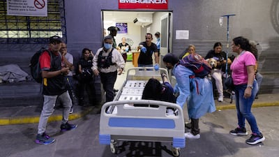 A person arrives at hospital in Caracas. EPA