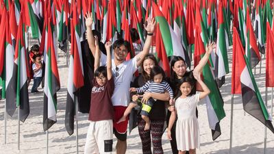 Jerecho Borja and his family attend the National Day festivities at Kite Beach in Dubai. Ruel Pableo for The National