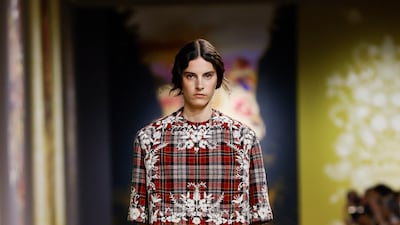 Dark tartan was softened with delicate floral patterns.