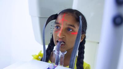 A young patient undergoes an X-Ray at the Aster Medcity Hospital at Kochi. Subhash Sharma for The National