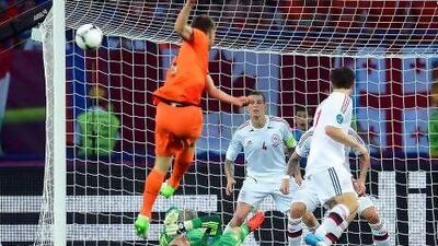 Stare as hard as you might, you cannot stop Klaas-Jan Huntelaar's strike from straying away from the goal.