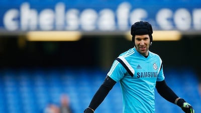 Chelsea goalkeeper Petr Cech warms up prior to their Premier League victory over Hull City on Saturday at Stamford Bridge. Clive Rose / Getty Images / December 13, 2014