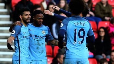 Sergio Aguero, left, scored Manchester City's first goal, and Leroy Sane the second in a 2-0 win over Sunderland on Sunday. Nigel Roddis / EPA