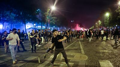 Fans of PSG on the Champs-Elysees. EPA