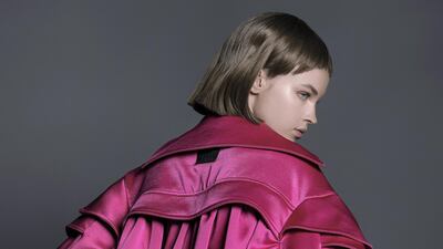 Weighty satin is assembled into a roomy, blouson-cut jacket. Courtesy Hussein Bazaza