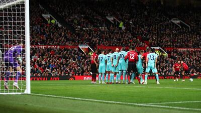 Juan Mata, who came on as a first-half substitute with Manchester United trailing 2-0, lines up a free kick. Reuters