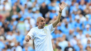 Pep Guardiola waves goodbye to Manchester City fans at the Etihad Stadium in East Manchester. The Spanish manager has brought unprecedented success to the club since his appointment in 2016. AFP