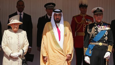 Queen Elizabeth II with the President of the United Arab Emirates, Sheikh Khalifa bin Zayed Al Nahyan,centre, and Prince Phillip on the Royal Dais in Windsor, as he begins a State Visit to the UK in 2013. AP Photo