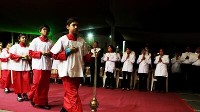 St Joseph’s Cathedral in Abu Dhabi put out 2,500 chairs for their Christmas Eve mass, but still many had to stand. Christopher Pike / The National