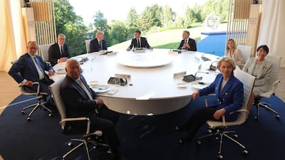 Japan's Prime Minister Sanae Takaichi, German Chancellor Friedrich Merz, Italy's Prime Minister Giorgia Meloni, Mr Trump, European Commission President Ursula von der Leyen, Canadian Prime Minister Mark Carney, Britain's Prime Minister Keir Starmer and Mr Macron attend the G7 summit. Reuters