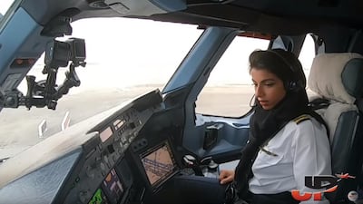 Emirati first officer, Shaima, takes off on flight EY037 on a rainy day from Abu Dhabi to Paris, France. Courtesy JustPlanes