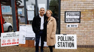 Mayor of London Sadiq Khan and his wife Saadiya arrive at a polling station to vote in local elections. EPA
