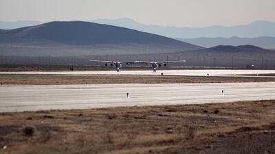 The WhiteKnightTwo returns after Virgin Galactic's SpaceShipTwo, dubbed the VSS Unity, completed its first ever free-flight test over Mojave, California, US. Kenneth Brown / Reuters