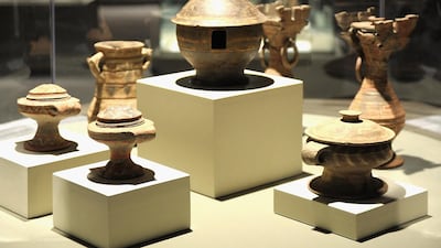 Ancient Chinese artifacts on display at the Terracotta Warriors exhibition at Discovery Times Square in New York City. AFP