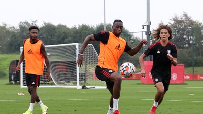 Aaron Wan-Bissaka and Hannibal Mejbri of Manchester United during a session at Carrington Training Ground. Getty Images