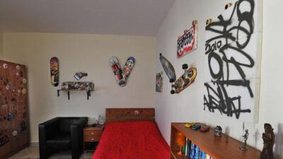 The 13-year-old son’s upstairs bedroom reflects his hobbies.