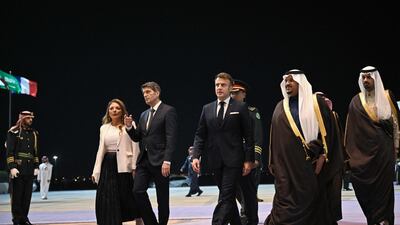 Prince Mohammed bin Abdulrahman, Deputy Governor of the Riyadh region, greets Mr Macron