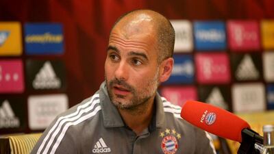 Bayern Munich coach Pep Guardiola speaks during a press conference at Aspire Academy in the Qatari capital Doha on January 11, 2016. AFP
