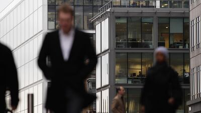 In the workplace, office relationships can be a tricky affair. Professionalism is key. Dan Kitwood/Getty Images