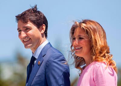 Prime Minister of Canada Justin Trudeau and his wife Sophie Gregoire Trudeau pictured in 2018. Mr Trudeau is self-isolating after his wife tested positive for the coronavirus. AFP