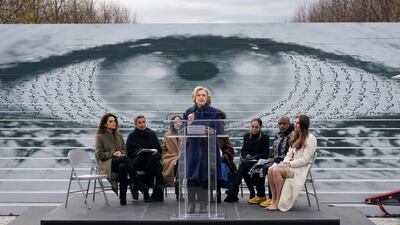 Ms Clinton speaks, flanked by Iranian artists and human rights attorneys and activists. AP