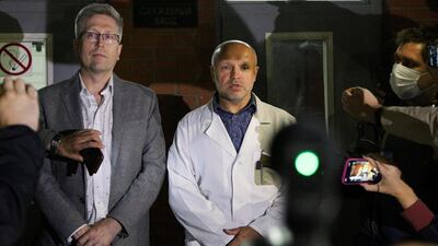 Anatoly Kalinichenko, deputy chief doctor of the Omsk Ambulance Hospital No. 1, right, and Boris Teplykh, head of the department of anaesthesiology and resuscitation of the Pirogov's medical centre, speak to the media at the intensive care unit where Alexei Navalny was hospitalised. AP