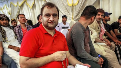 Majid from Pakistan offers prayers at the centre. Victor Besa / The National