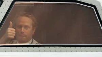 A pilot gives the thumps up as a plane leaves Belfast City Airport in Northern Ireland yesterday.