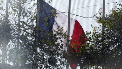 The French national flag is raised at the French embassy, after the ousting of Syria's Bashar Al Assad, in Damascus, on December 17, 2024. Reuters