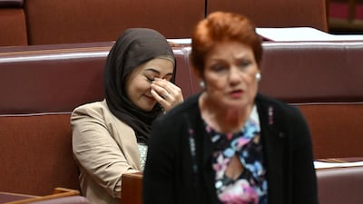 Australian senator Fatima Payman listens to One Nation leader Pauline Hanson address politicians, as she is censured for 'inflammatory and divisive' remarks about Muslims. Reuters
