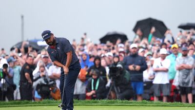JJ Spaun of the United States sinks a 64-putt on the 18th green to win the US Open at Oakmont. AFP