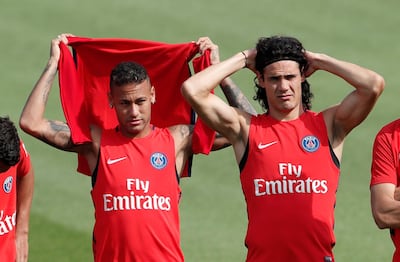 PSG's Neymar, left, and Edinson Cavani will face Bayern Munich, Celtic and Anderlecht in this season's Champions League group stage. Benoit Tessier / Reuters