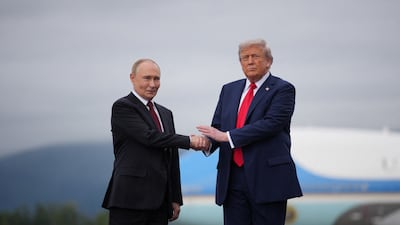 US President Donald Trump greeting Russian President Vladimir Putin at Joint Base Elmendorf-Richardson in Alaska in August. Getty Images
