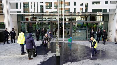 Black paint on the pavement outside the Department of Levelling Up, Housing and Communities in London following the protest. PA