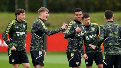 Rhys Bennett jokes with Casemiro. PA
